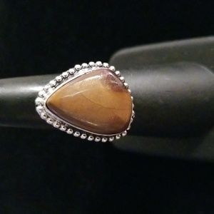 Abstract Teardrop Mookite Ring Dotted Border